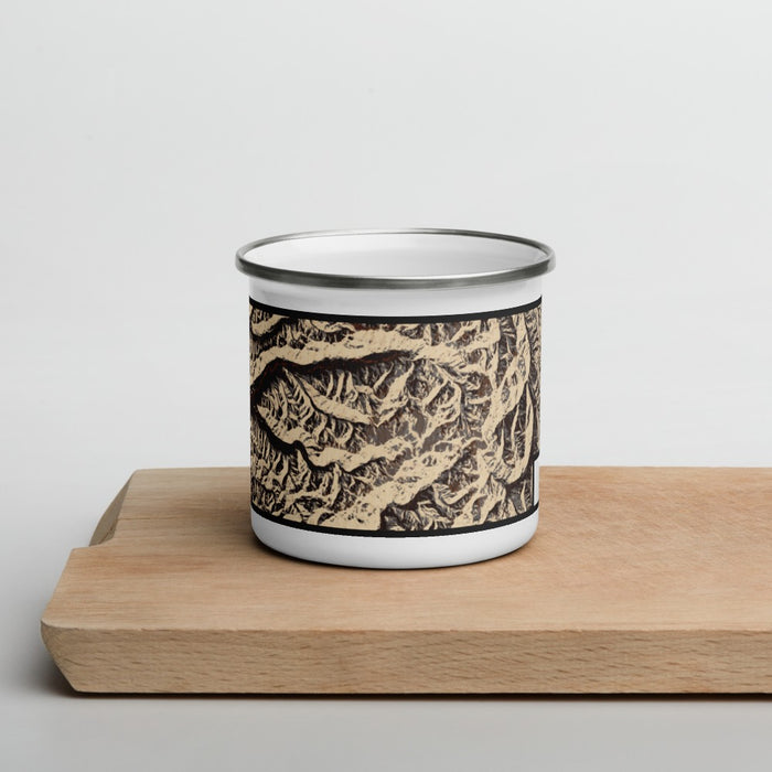 Front View Custom Olympic National Park Map Enamel Mug in Ember on Cutting Board