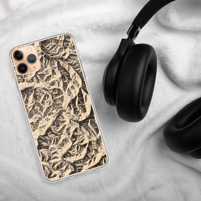 Custom Olympic National Park Map Phone Case in Ember on Table with Black Headphones