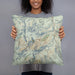 Person holding 18x18 Custom Olympic Valley California Map Throw Pillow in Woodblock