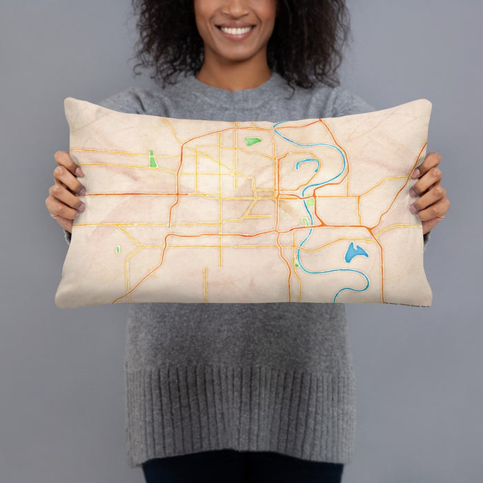 Person holding 20x12 Custom Omaha Nebraska Map Throw Pillow in Watercolor