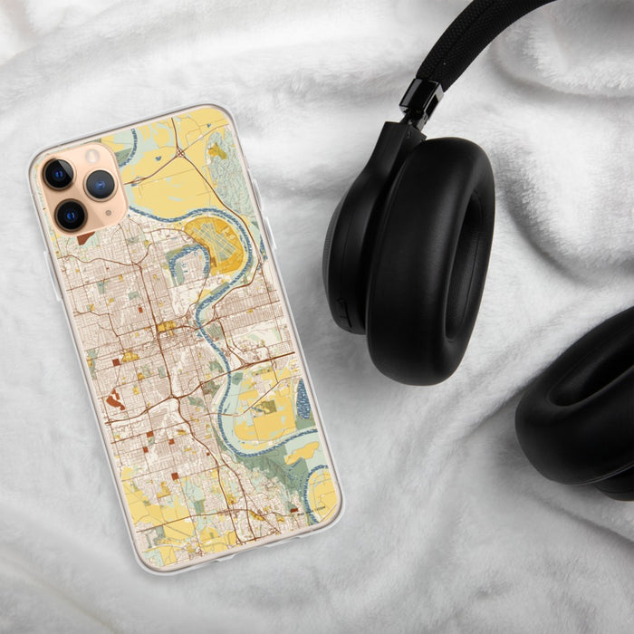 Custom Omaha Nebraska Map Phone Case in Woodblock on Table with Black Headphones