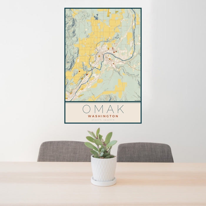 24x36 Omak Washington Map Print Portrait Orientation in Woodblock Style Behind 2 Chairs Table and Potted Plant