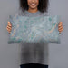 Person holding 20x12 Custom Omak Washington Map Throw Pillow in Afternoon