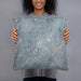 Person holding 18x18 Custom Omak Washington Map Throw Pillow in Afternoon