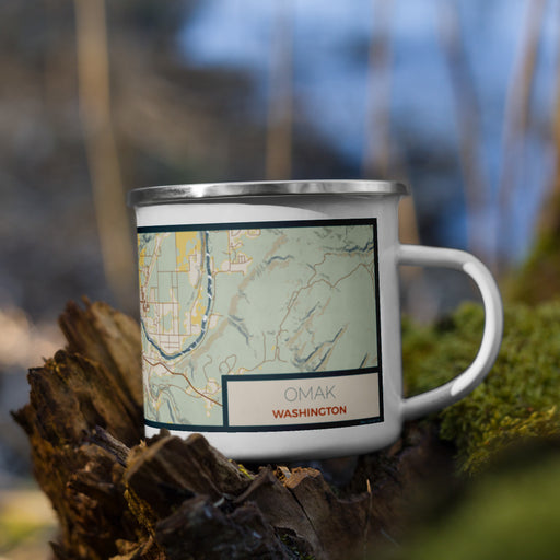 Right View Custom Omak Washington Map Enamel Mug in Woodblock on Grass With Trees in Background