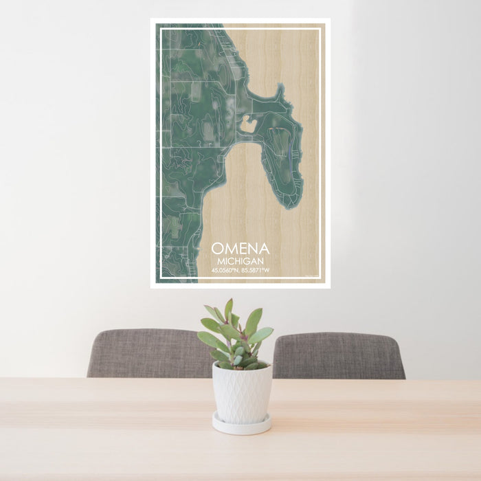 24x36 Omena Michigan Map Print Portrait Orientation in Afternoon Style Behind 2 Chairs Table and Potted Plant