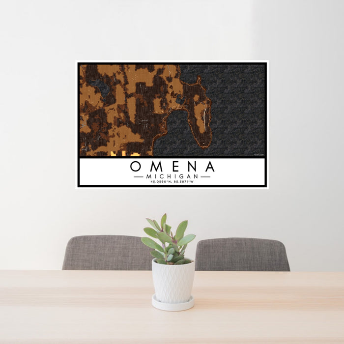 24x36 Omena Michigan Map Print Lanscape Orientation in Ember Style Behind 2 Chairs Table and Potted Plant