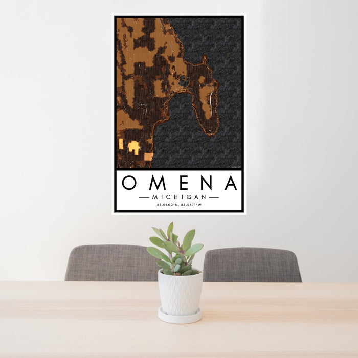 24x36 Omena Michigan Map Print Portrait Orientation in Ember Style Behind 2 Chairs Table and Potted Plant