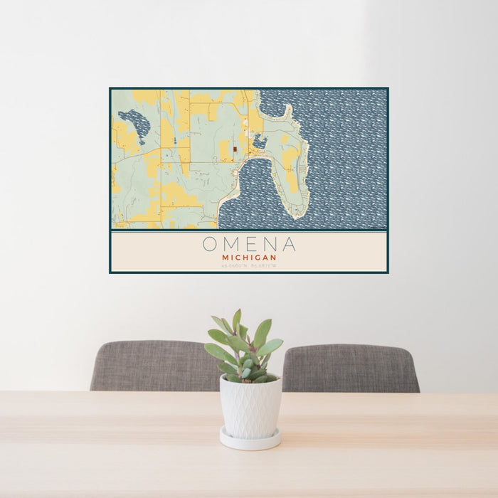 24x36 Omena Michigan Map Print Lanscape Orientation in Woodblock Style Behind 2 Chairs Table and Potted Plant