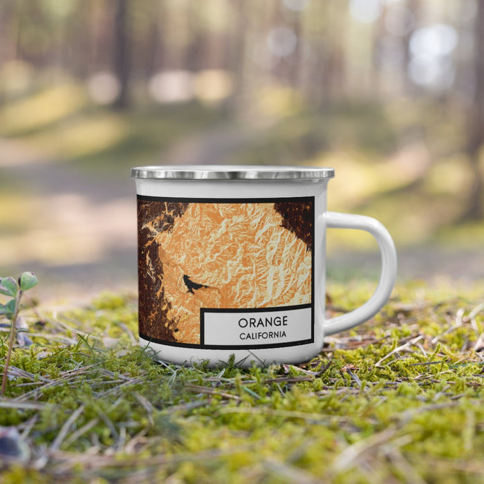 Right View Custom Orange California Map Enamel Mug in Ember on Grass With Trees in Background