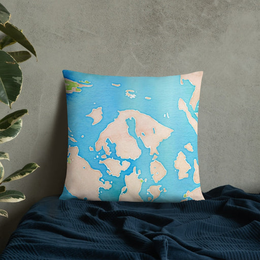 Custom Orcas Island Washington Map Throw Pillow in Watercolor on Bedding Against Wall