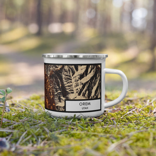 Right View Custom Orem Utah Map Enamel Mug in Ember on Grass With Trees in Background