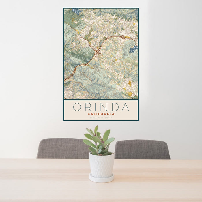 24x36 Orinda California Map Print Portrait Orientation in Woodblock Style Behind 2 Chairs Table and Potted Plant