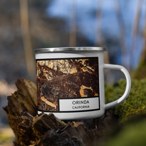 Right View Custom Orinda California Map Enamel Mug in Ember on Grass With Trees in Background