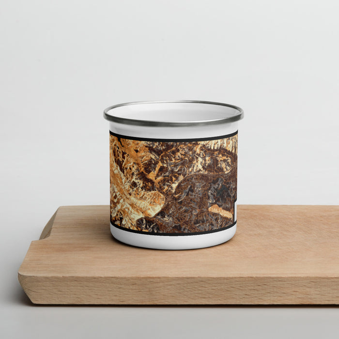 Front View Custom Orinda California Map Enamel Mug in Ember on Cutting Board