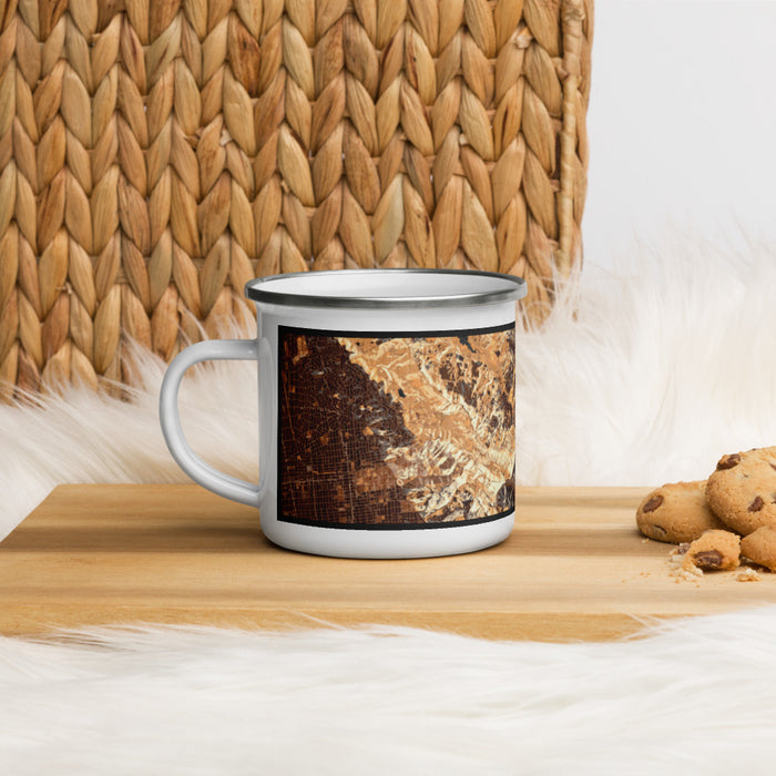 Left View Custom Orinda California Map Enamel Mug in Ember on Table Top