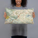 Person holding 20x12 Custom Orinda California Map Throw Pillow in Woodblock