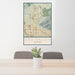 24x36 Oro Valley Arizona Map Print Portrait Orientation in Woodblock Style Behind 2 Chairs Table and Potted Plant