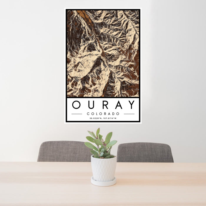 24x36 Ouray Colorado Map Print Portrait Orientation in Ember Style Behind 2 Chairs Table and Potted Plant