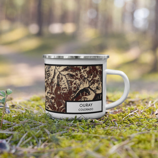 Right View Custom Ouray Colorado Map Enamel Mug in Ember on Grass With Trees in Background