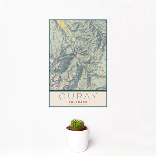 12x18 Ouray Colorado Map Print Portrait Orientation in Woodblock Style With Small Cactus Plant in White Planter