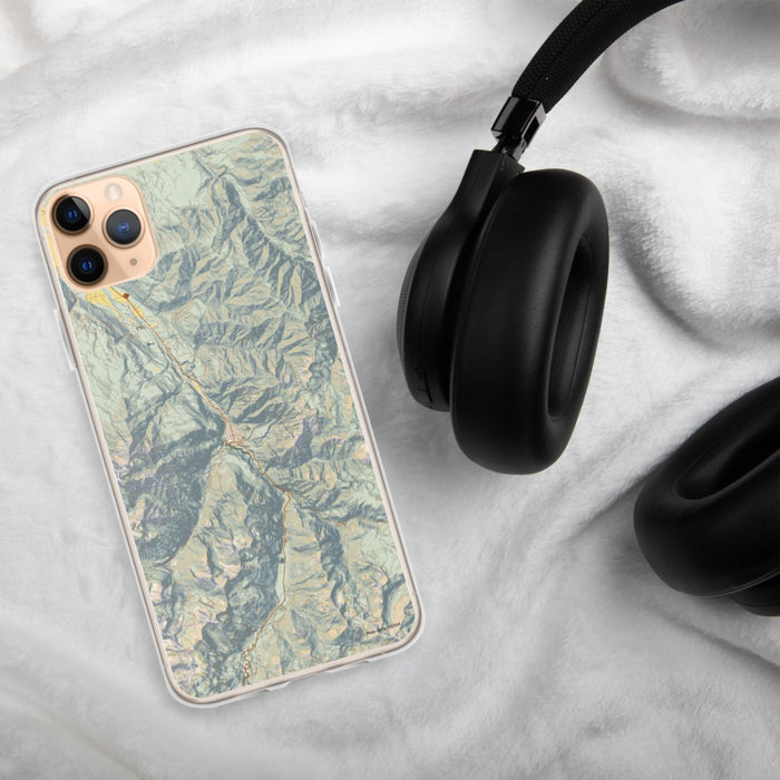 Custom Ouray Colorado Map Phone Case in Woodblock on Table with Black Headphones
