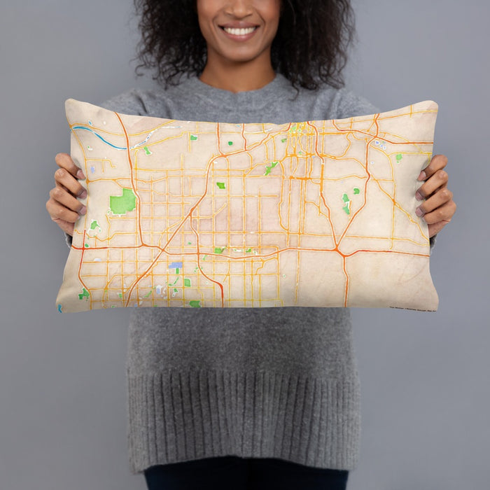 Person holding 20x12 Custom Overland Park Kansas Map Throw Pillow in Watercolor