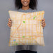 Person holding 18x18 Custom Overland Park Kansas Map Throw Pillow in Watercolor