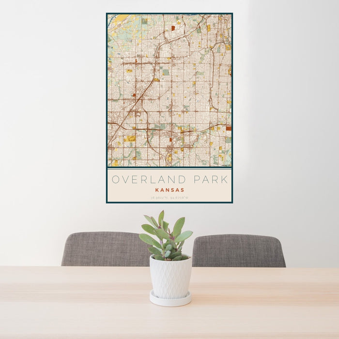24x36 Overland Park Kansas Map Print Portrait Orientation in Woodblock Style Behind 2 Chairs Table and Potted Plant