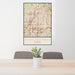 24x36 Overland Park Kansas Map Print Portrait Orientation in Woodblock Style Behind 2 Chairs Table and Potted Plant