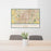 24x36 Overland Park Kansas Map Print Landscape Orientation in Woodblock Style Behind 2 Chairs Table and Potted Plant