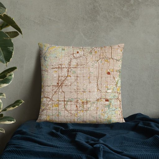 Custom Overland Park Kansas Map Throw Pillow in Woodblock on Bedding Against Wall
