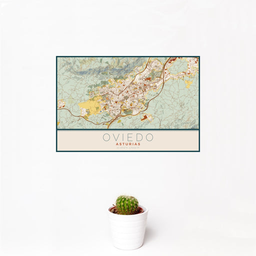 12x18 Oviedo Asturias Map Print Landscape Orientation in Woodblock Style With Small Cactus Plant in White Planter