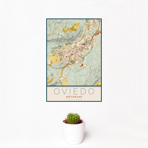 12x18 Oviedo Asturias Map Print Portrait Orientation in Woodblock Style With Small Cactus Plant in White Planter