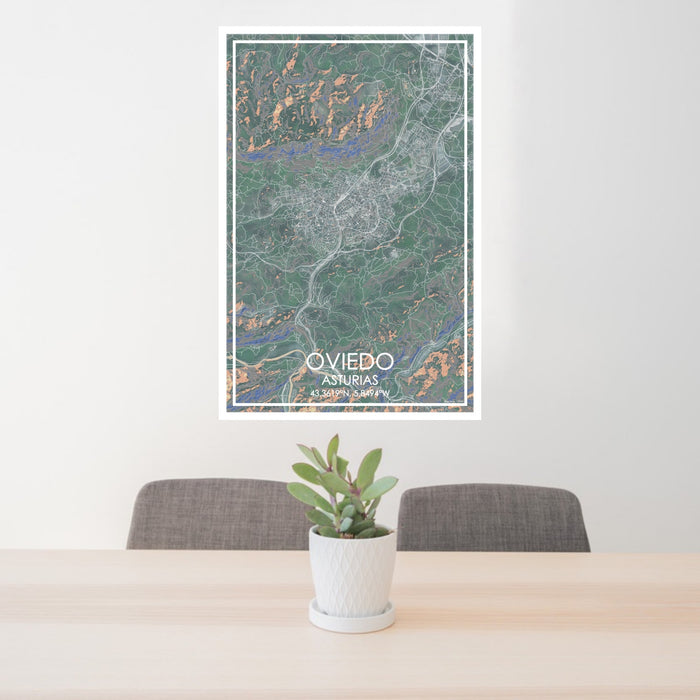 24x36 Oviedo Asturias Map Print Portrait Orientation in Afternoon Style Behind 2 Chairs Table and Potted Plant