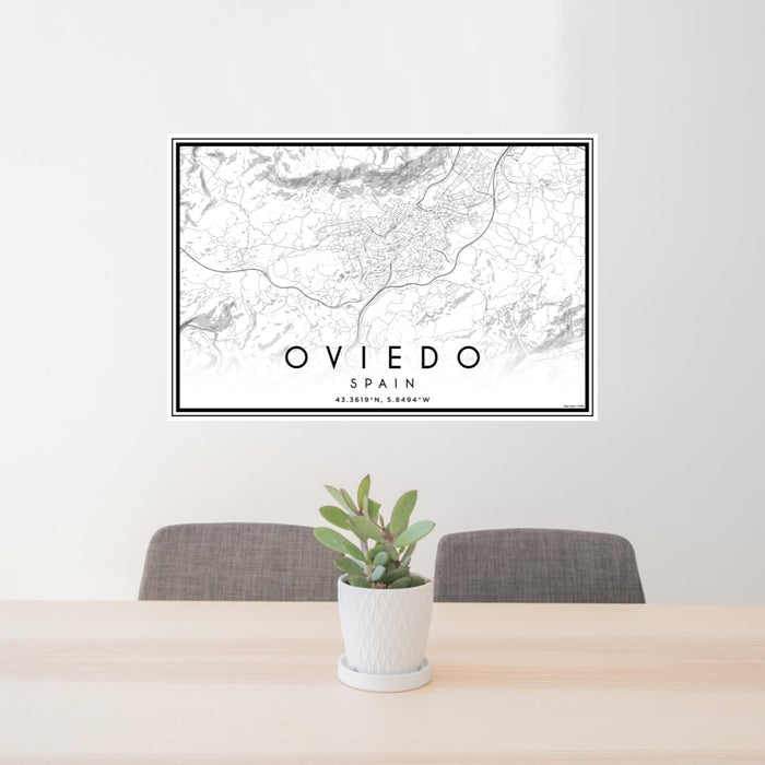 24x36 Oviedo Spain Map Print Lanscape Orientation in Classic Style Behind 2 Chairs Table and Potted Plant