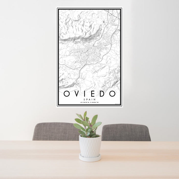 24x36 Oviedo Spain Map Print Portrait Orientation in Classic Style Behind 2 Chairs Table and Potted Plant