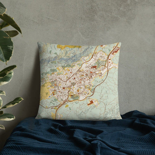 Custom Oviedo Spain Map Throw Pillow in Woodblock on Bedding Against Wall