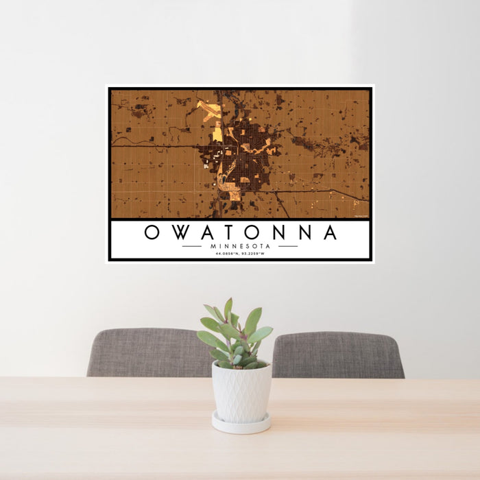 24x36 Owatonna Minnesota Map Print Landscape Orientation in Ember Style Behind 2 Chairs Table and Potted Plant