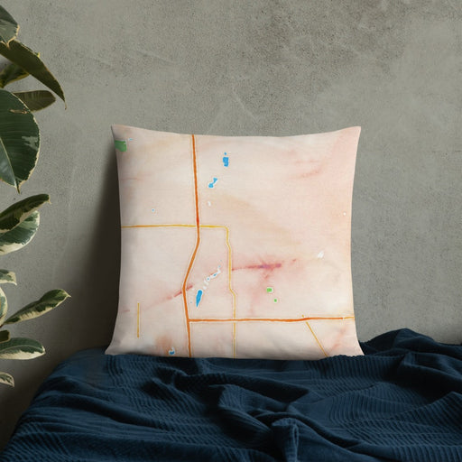 Custom Owatonna Minnesota Map Throw Pillow in Watercolor on Bedding Against Wall