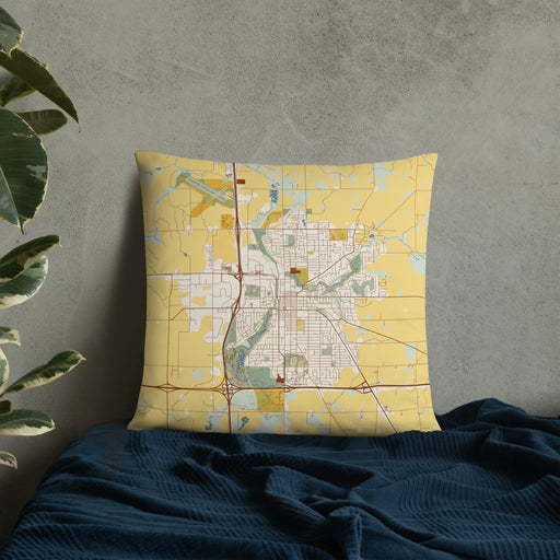Custom Owatonna Minnesota Map Throw Pillow in Woodblock on Bedding Against Wall
