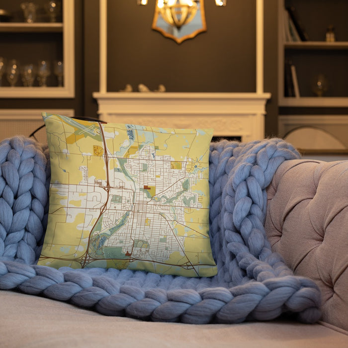Custom Owatonna Minnesota Map Throw Pillow in Woodblock on Cream Colored Couch