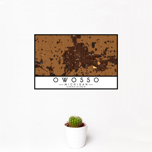 12x18 Owosso Michigan Map Print Landscape Orientation in Ember Style With Small Cactus Plant in White Planter