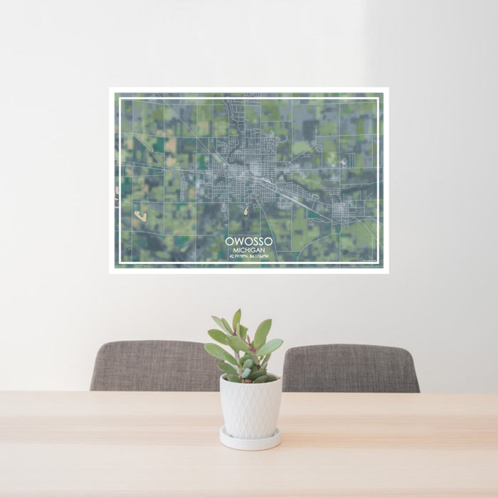 24x36 Owosso Michigan Map Print Lanscape Orientation in Afternoon Style Behind 2 Chairs Table and Potted Plant