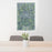 24x36 Owosso Michigan Map Print Portrait Orientation in Afternoon Style Behind 2 Chairs Table and Potted Plant