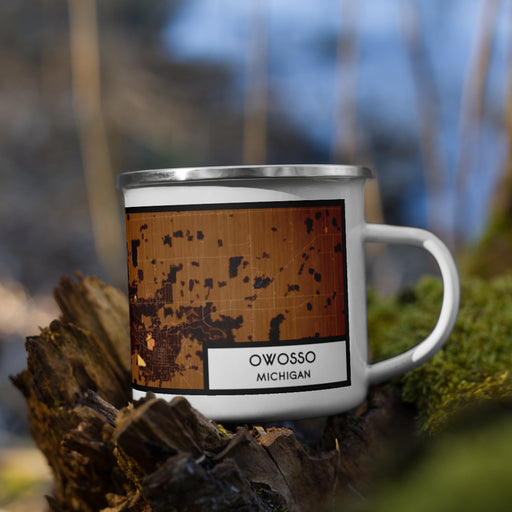 Right View Custom Owosso Michigan Map Enamel Mug in Ember on Grass With Trees in Background