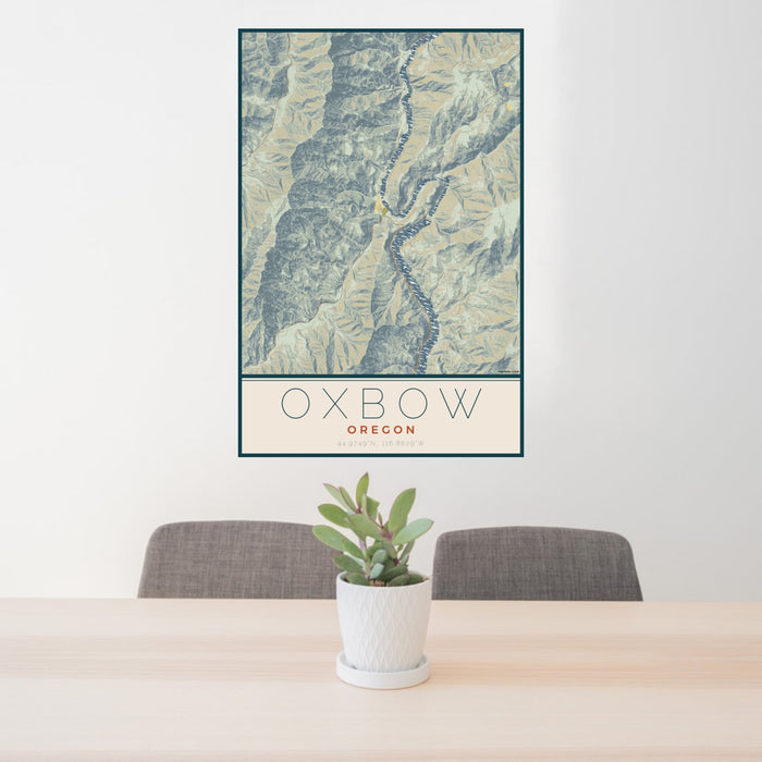 24x36 Oxbow Oregon Map Print Portrait Orientation in Woodblock Style Behind 2 Chairs Table and Potted Plant