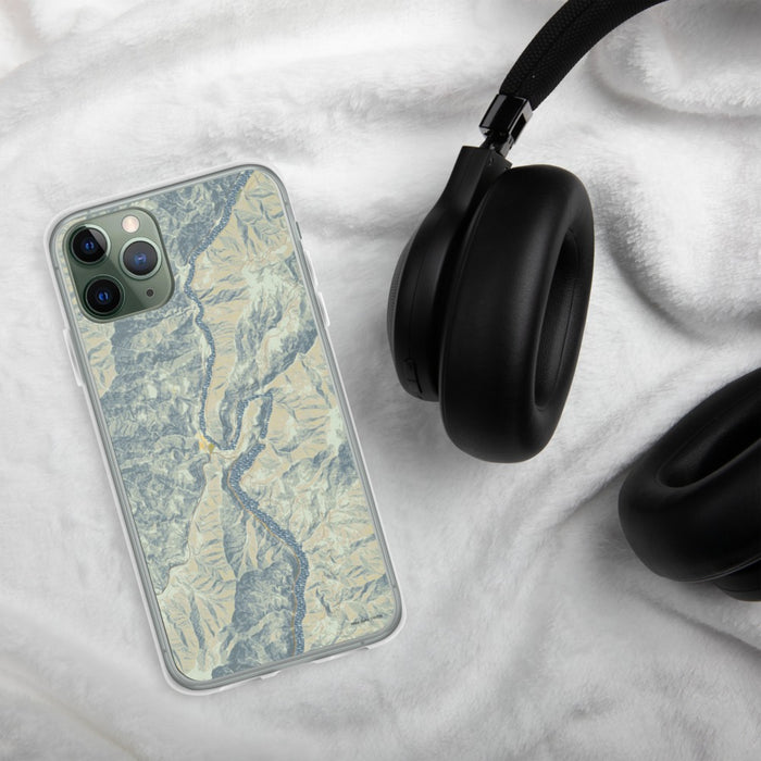 Custom Oxbow Oregon Map Phone Case in Woodblock on Table with Black Headphones