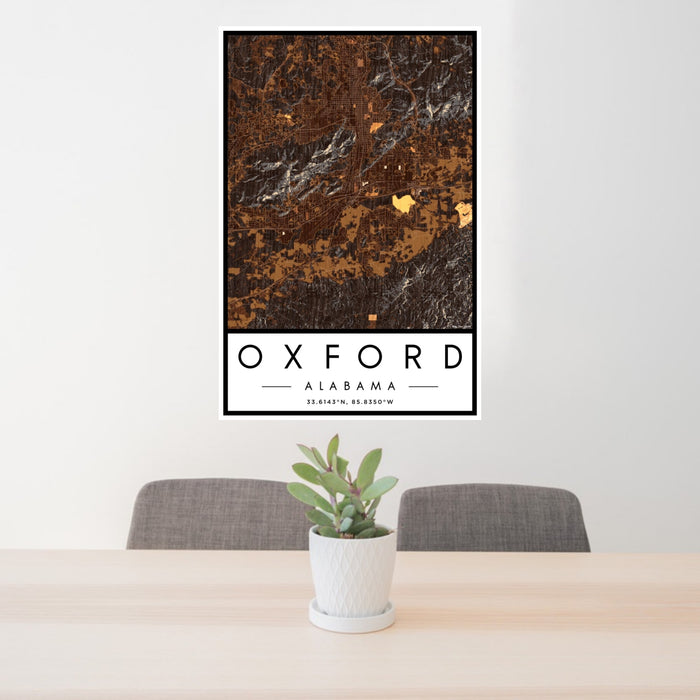 24x36 Oxford Alabama Map Print Portrait Orientation in Ember Style Behind 2 Chairs Table and Potted Plant