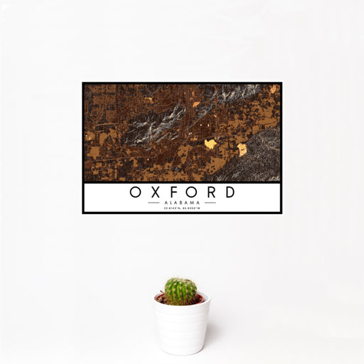 12x18 Oxford Alabama Map Print Landscape Orientation in Ember Style With Small Cactus Plant in White Planter